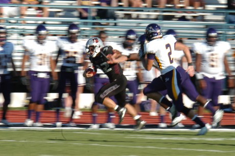 Senior running back, Patrick Granchelli carries the ball down field for the tigers in Saturdays game against the University of MaryHardin Baylor. Photo by Aidan Kirksey.