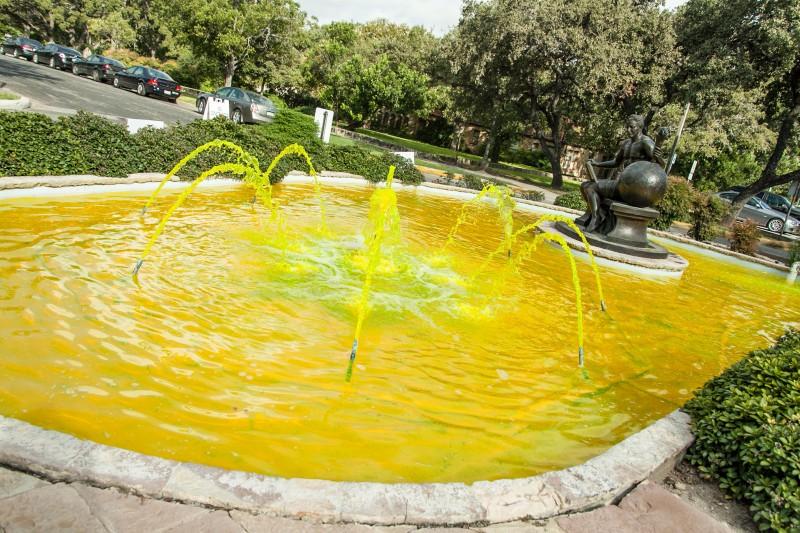 This week, while the San Antonio Water System tested Trinityâ€™s water recycling systems, the fountain in front of Chapman Graduate Center, as well as other fountains around campus, turned a peculiar yellow-green color. Once the test was completed, all the water filtered back to its natural shade. Photo by Anh-Viet Dinh.