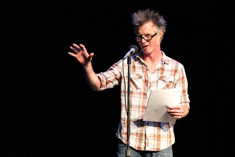 Poet Matt Hart delivered poems from his new book during a poetry reading in the Attic Theater last Thursday. Photo by Megan McLoughlin.