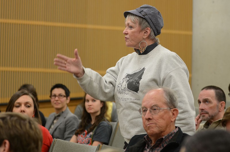 A member of the San Antonio community voices her opinion during the Darwin Day debate held in a Northrup classroom. Photo by Aidan Kirksey.