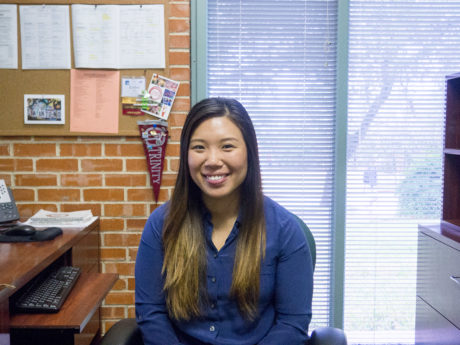 ESTHER KIM poses in her office as she takes a break from planning the activities for the fall orientation team. Applications to serve on the upcoming team were recently released, and will be due Friday, February 3rd. 
By Miguel Weber