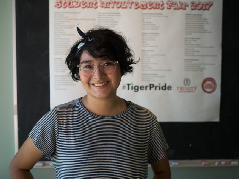 ANDREA ACEVEDO poses in a communication classroom where she would work on her research.
photo by Amani Canada