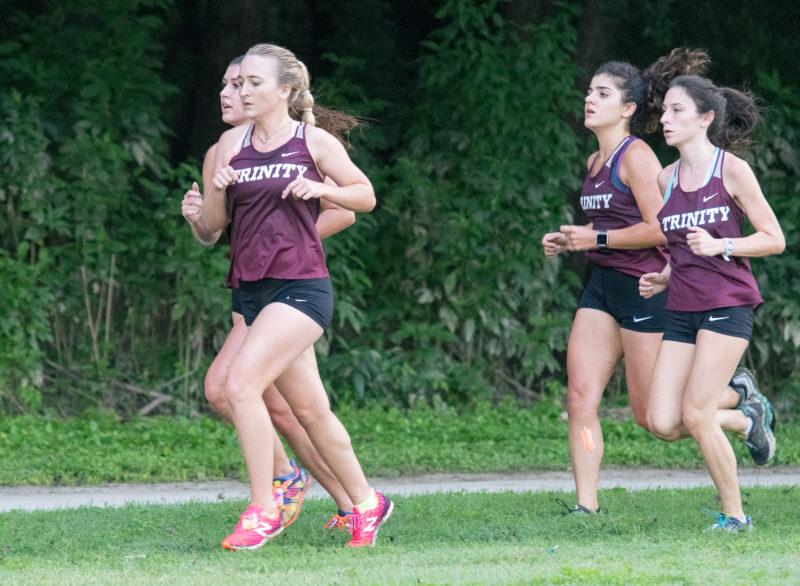 The womens cross country team sported their new Nike jerseys during their opening meet on Sept. 1. Photo by Allison Wolff