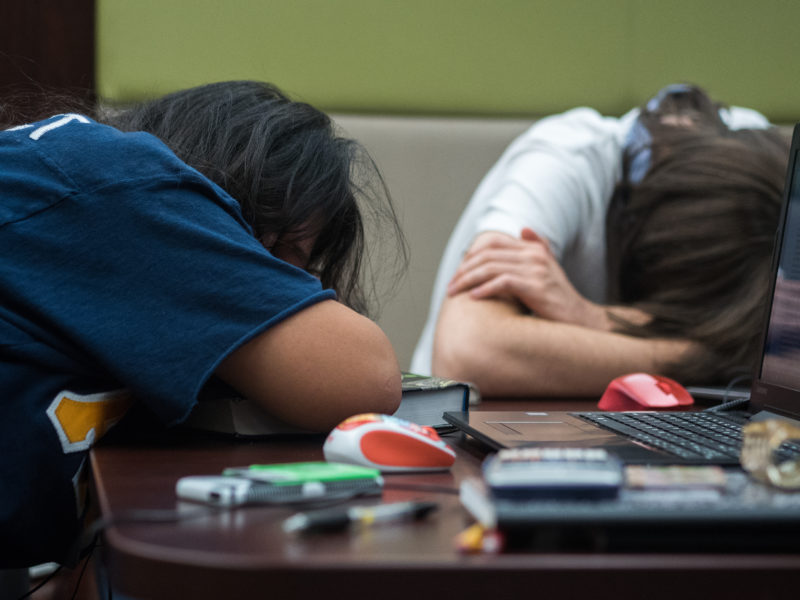 A common sight on campus: students taking a nap while on break from school work. Photo by Amani Canada 