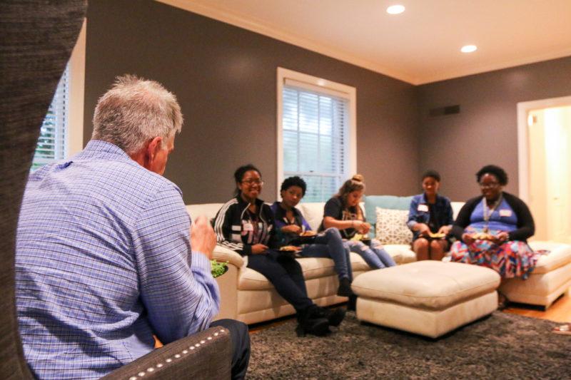David Tuttle, dean of students, joins Black Student Union members in his living room. photo by Kathleen Creedon