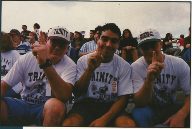 Students support the team at a football game during Alumni Weekend in 1995. File photo