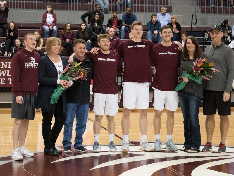 Mens basketball seniors pose for a photo at their last home game. photo by Allison Wolff