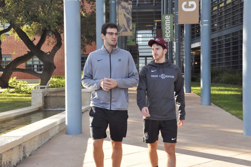 Senior McCaleb Taylor takes a walk with first-year Gabriel Dominguez. Taylor prioritizes serving as a source of support for his teammates. Photo credit: Megan Flores