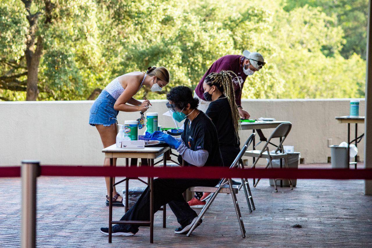 Students+check-in+at+Laurie+Auditorium+for+COVID-19+testing+during+move-in.+Testing+was+provided+free-of-charge+by+Trinity.+Photo+credit%3A+Genevieve+Humphreys