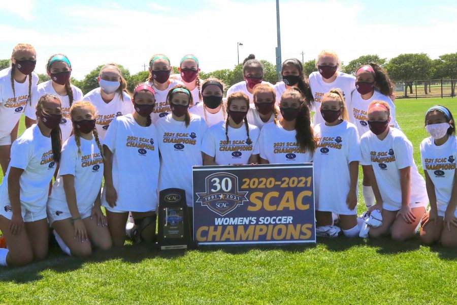 Trinitys womens soccer team poses with the SCAC championship trophy. This was the Tigers 24th SCAC title. Photo provided by Trinitys Department of Athletics