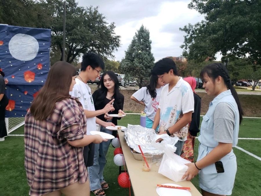 VSA students handing out food at the Mid-Autumn Festival.