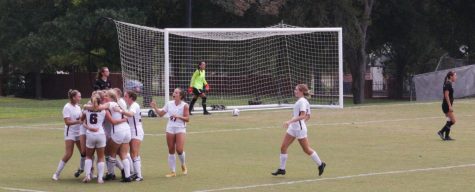 Trinity University Womens Soccer team celebrating after they scored their first goal against Chapman