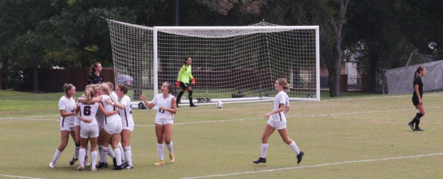 Trinity+University+Womens+Soccer+team+celebrating+after+they+scored+their+first+goal+against+Chapman