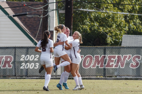 Hanna Khan, Emily Hayes, Maya Ozymy and Nina Pollak celebrate Trinitys goal in the second half of the SCAC Championship at Paul McGinlay Field.