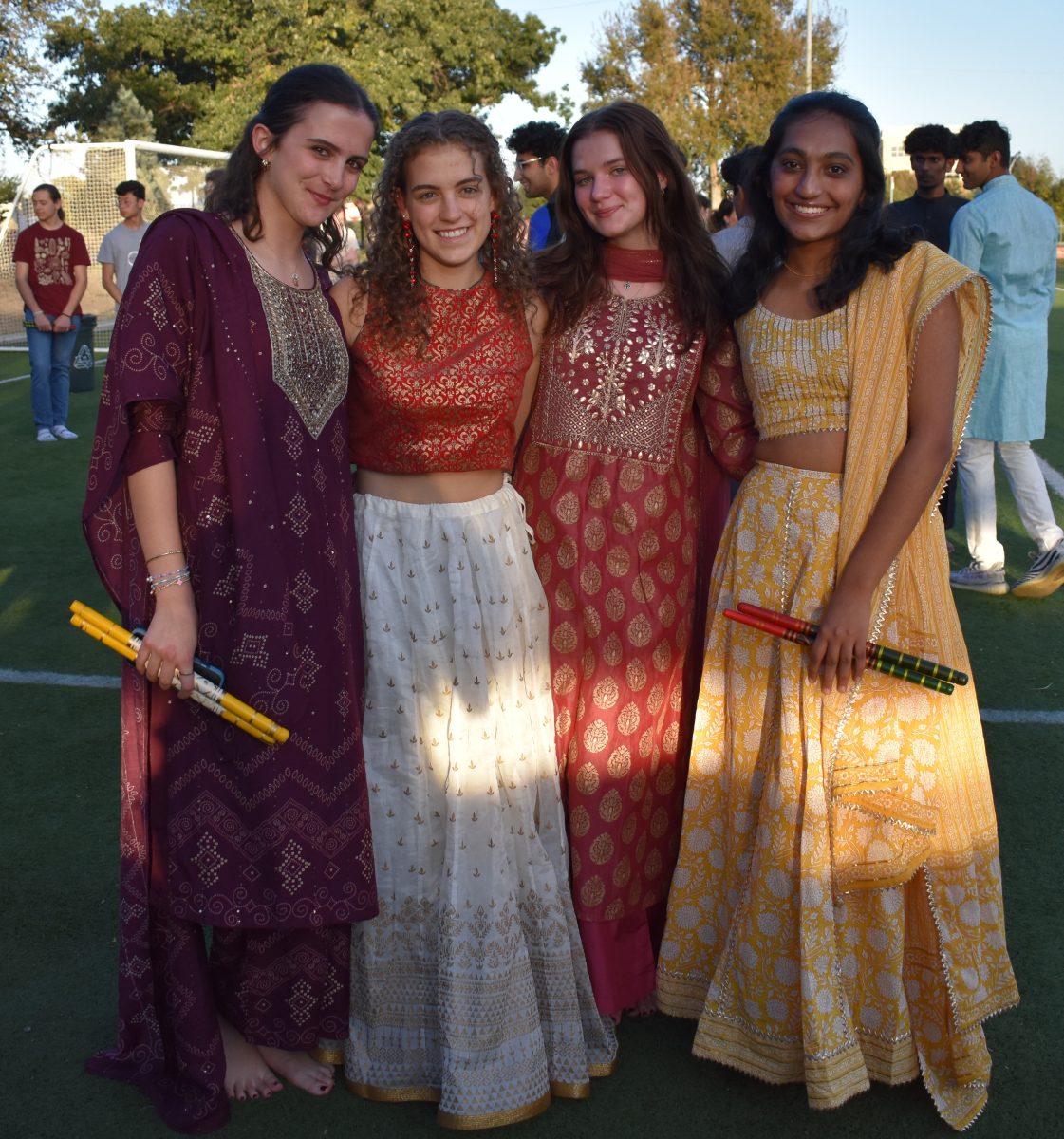 Participants in South Asian dress attire for Navaratri
