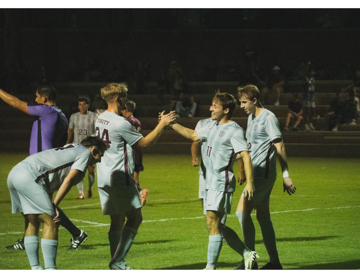 Hunter Cain and Kassen Dilworth celebrating after a goal.