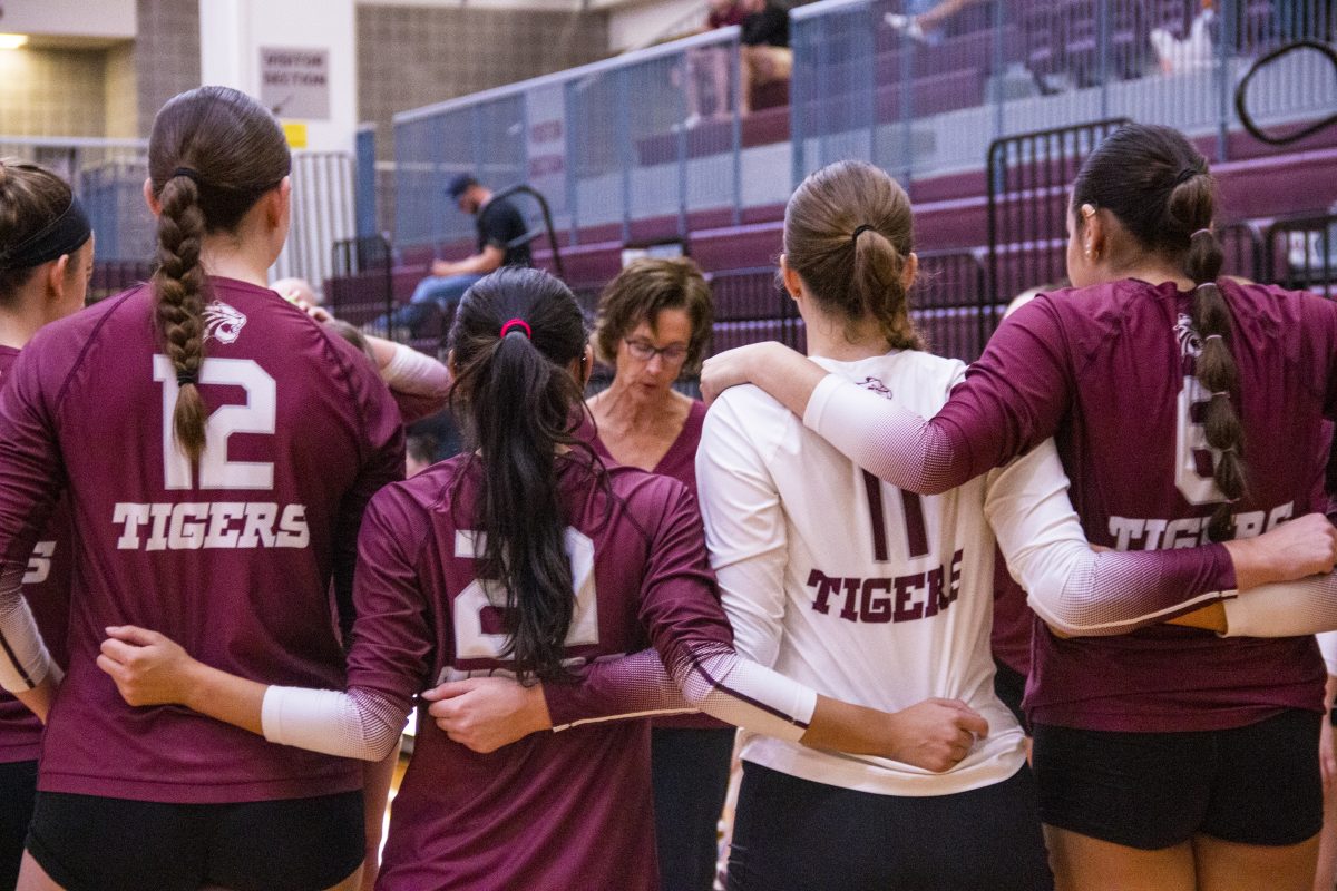 Volleyball team waits for game to start