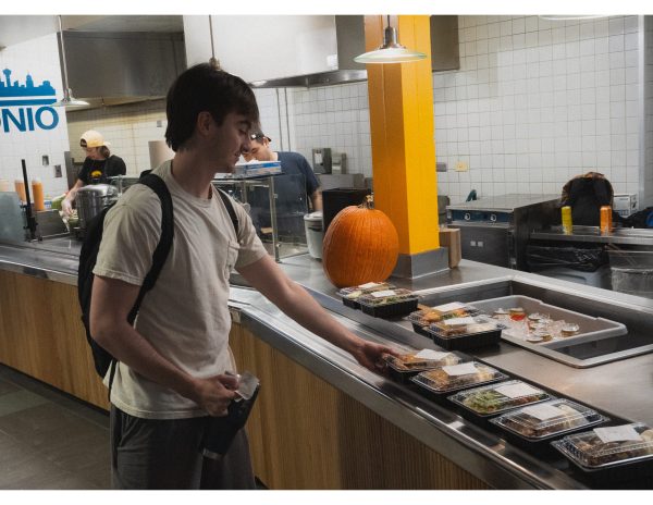 Senior Ben Cooper picks up his food at Taste of San Antonio.