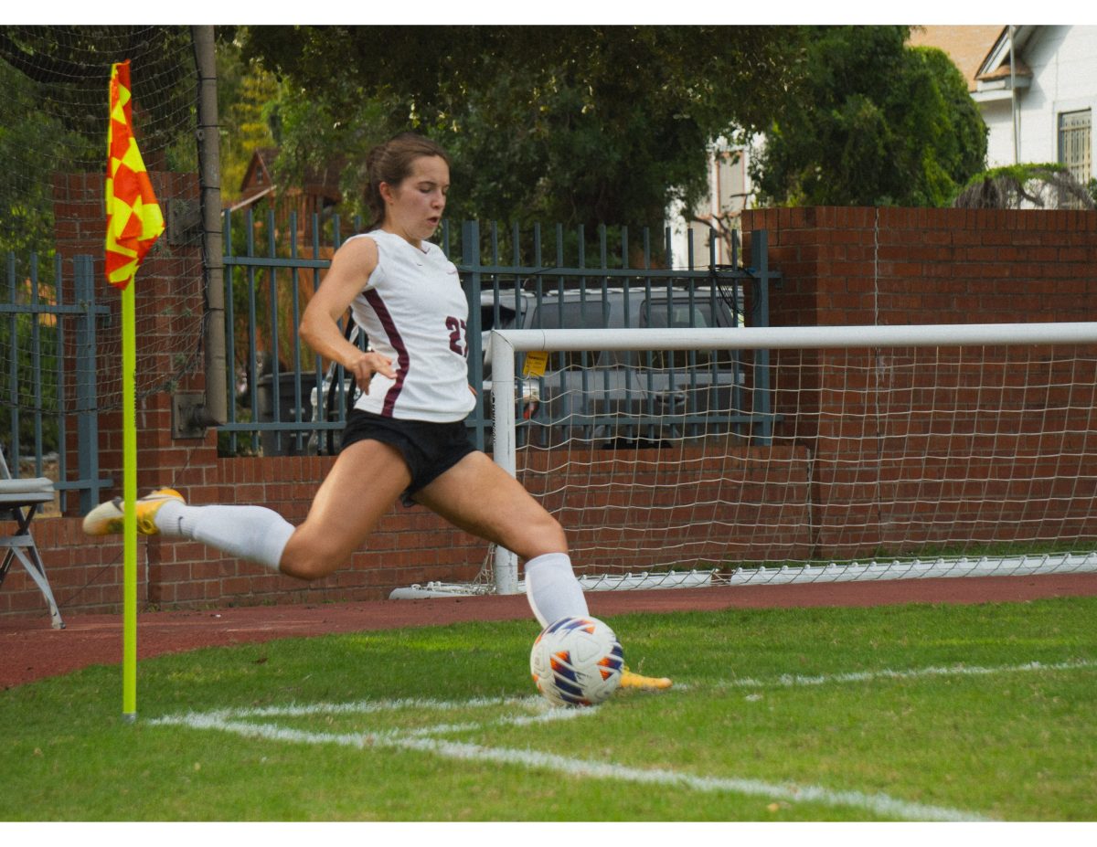 Michaela Bosco smashes a corner shot.