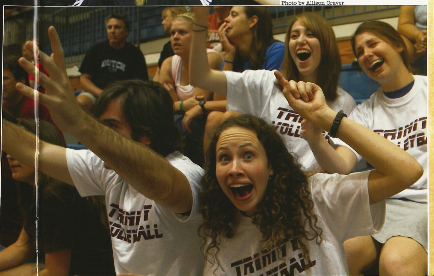 Students cheering in the stands at a Volleyball game. Photo Credit:  photo by Allison Craver, Mirage Yearbook 2007.