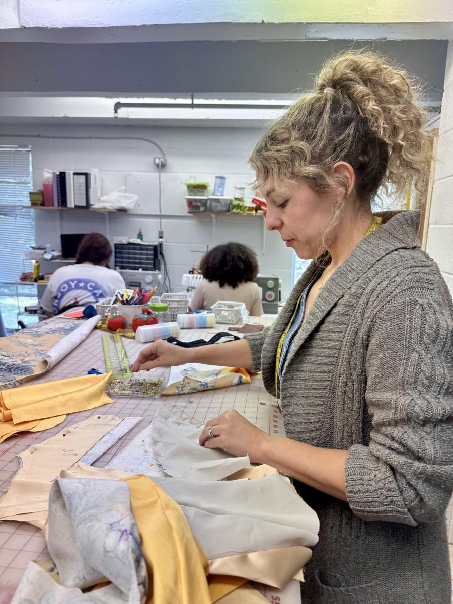Rachael Lorenzetti works on Elsa’s coronation costume.