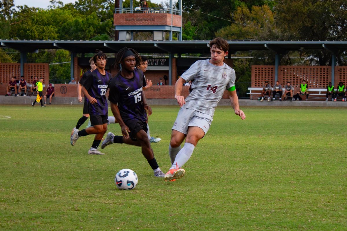 Junior Samuel Theiss goes after the ball