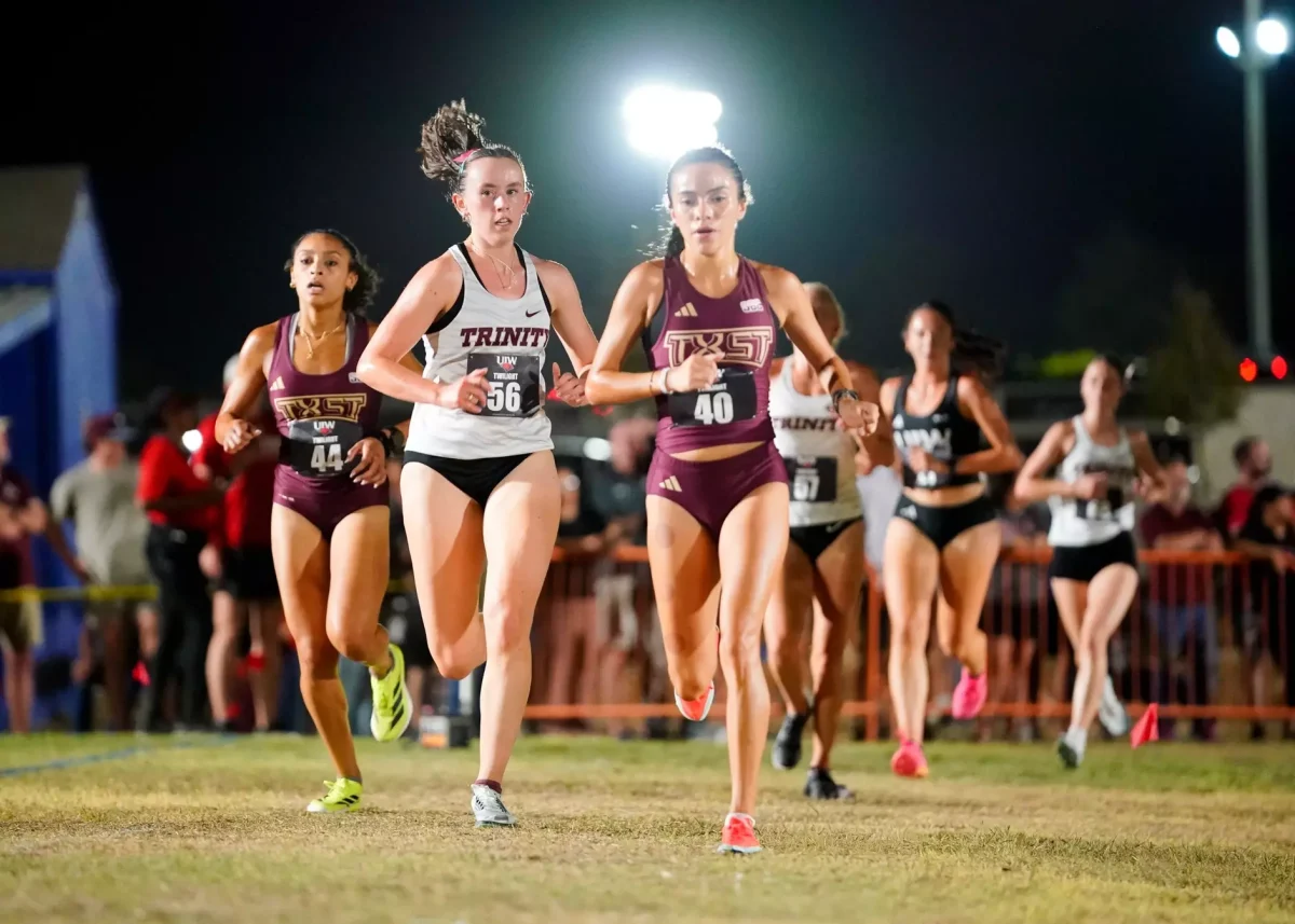 Josette Gurulr runs at the UIW Twilight on Aug. 29.  I  photo courtesy of TRINITY SPORTS INFORMATION