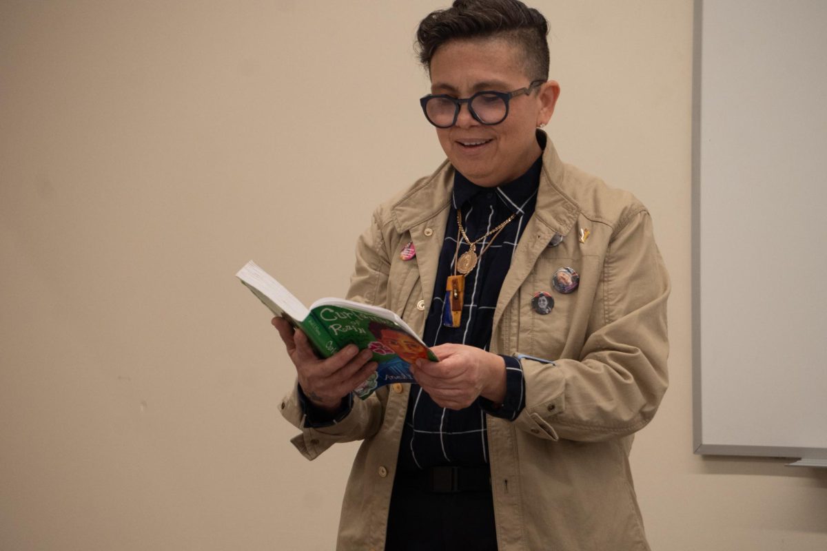 Anel Flores reads a passage from their Curtains of Rain (2025) to the students of U.S. Latinx Culture and Artistic Expressions on February 10th.
