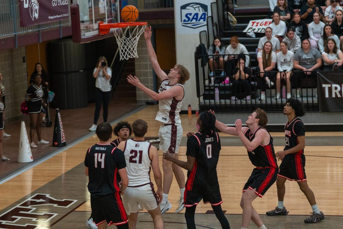 Will Bronson ('28) scores an open layup. 