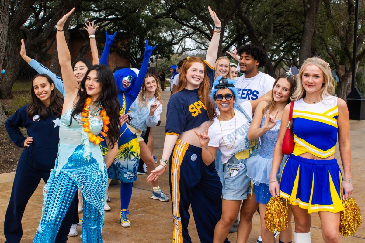 Decked out in blue and yellow, Spurs welcome new members on Bid Day.