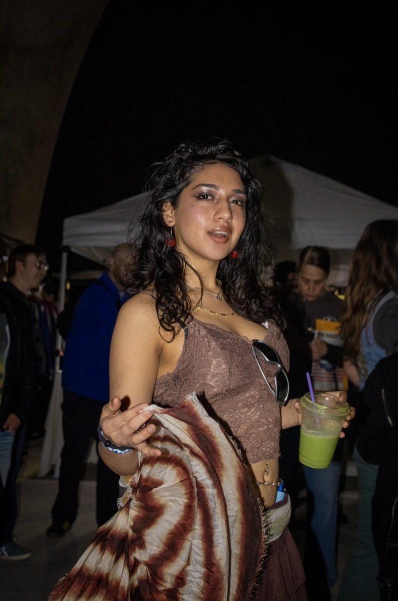 Vivian Cueva and others dance to electro beats at Confluence Park, featuring DJs Jobot from Minneapolis, Sneakers Dj from Germany, and San Antonio's BittyScorp on Feb. 7.