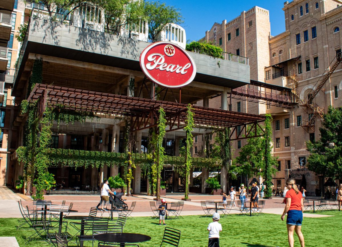 San Antonio families mill about the Pearl on a sunny day