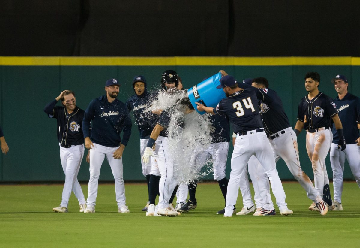 The Missions celebrate Braedon Karpathios' walk-off single in the 10th inning to give the San Antonio Missions their first home win of the 2026 season. Photo courtesy of Viannah Gomes/San Antonio Missions