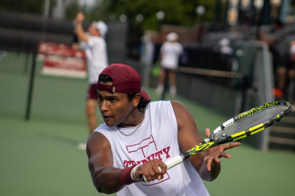 Sophomore Roshin Kamath, a finance major, swings during play at the Pittman Tennis Courts at Trinity University on April 17, 2026.