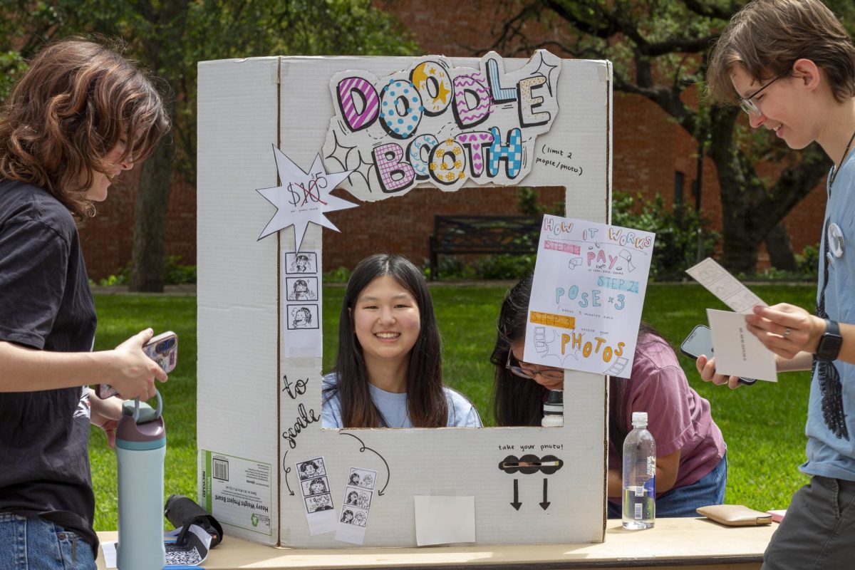 Some visitors said the doodle booth was their favorite table at the Art Market. Visitors could pay $5 to have live drawings made of themselves and their friends.