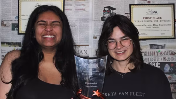 Diya Contractor and Samara Gerstle pose with First Place in Overall Excellence for Texas Student Newspapers from the Texas Intercollegiate Press Association.