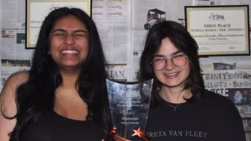Diya Contractor and Samara Gerstle pose with First Place in Overall Excellence for Texas Student Newspapers from the Texas Intercollegiate Press Association.