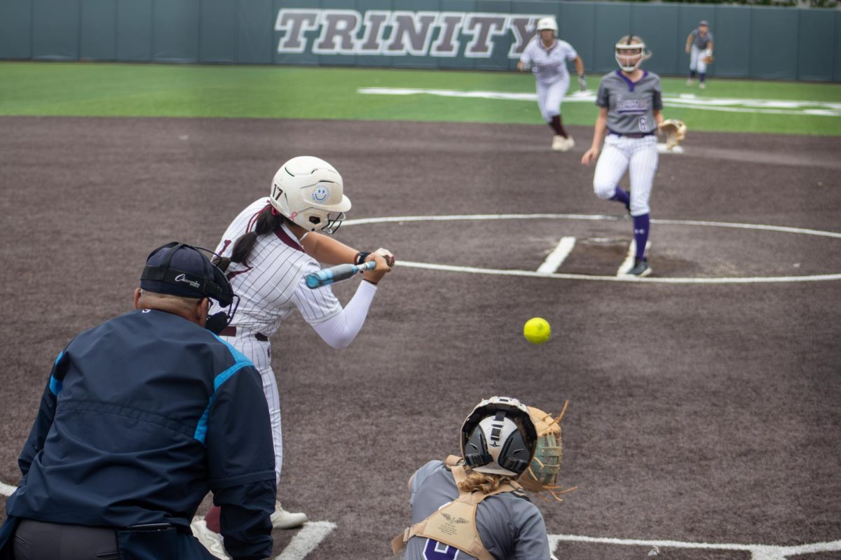Sophomore Mariana Garcia swings at a pitch during play at the softball field at Trinity University on April 18, 2026.
