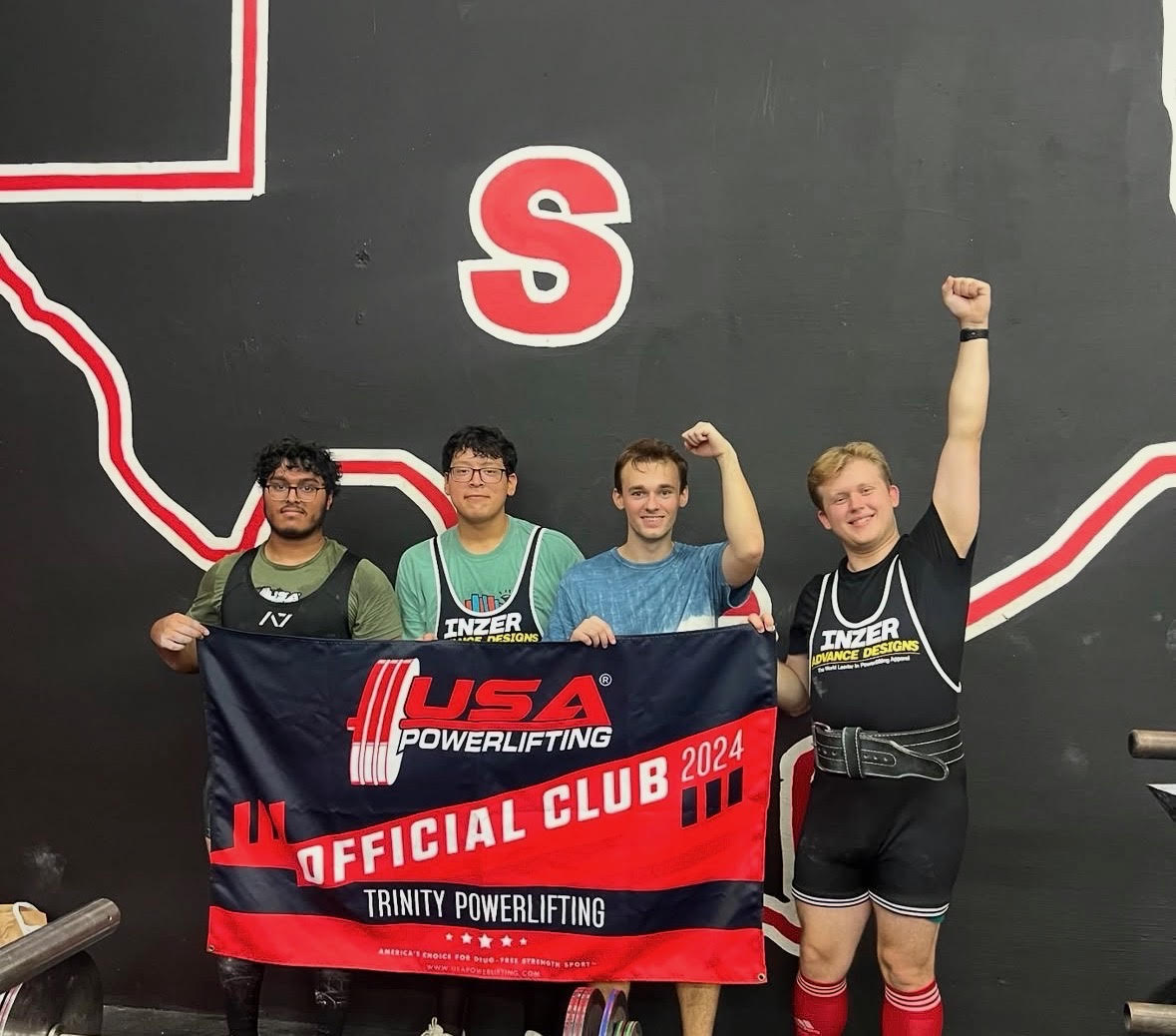 SIDDHARTH NELAKURTHI, JULIO MELARA, ROBIN GEMANARU and ROWAN DE LOS REYES celebrate at a Powerlifting competiton.  I Photo courtesy of TRINITY POWERLIFTING  